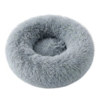 Rundes Haustierbett aus Kunstfell | Nylon & gepolsterter erhöhter Rand | Waschbares Hundebett und Katzenbett